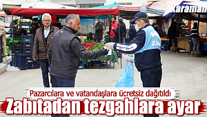 Pazarcılara ve vatandaşlara ücretsiz dağıtıdı