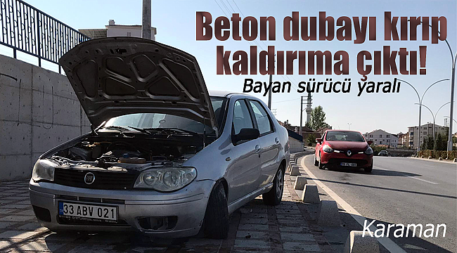 Bayan sürücü beton bariyeri kırarak kaldırıma çıktı