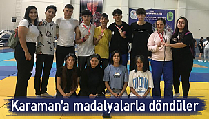 Kuşak güreş takımı Karaman'a madalyalarla döndü