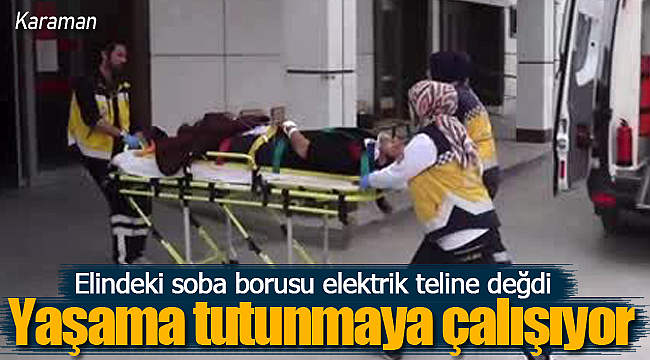 Elindeki soba borusu elektrik teline değdi ağır yaralandı