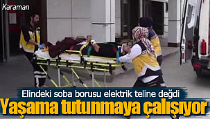 Elindeki soba borusu elektrik teline değdi ağır yaralandı