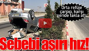 Refüje çarpan otomobil karşı şeride takla attı