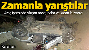 Devrilen otomobilde 3 kişi sıkıştı